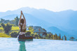 © 220 Selfmade studio - Beautiful Asian woman practice yoga Lotus pose on the pool above the Mountain peak in the morning in front of beautiful nature views in SAPA vietnam,Feel so comfortable and relax with yoga in holiday