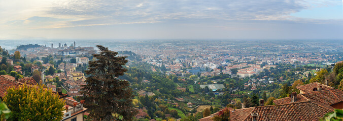 Wall Mural - View of Bergamo Upper and Lower city from Saint Vigilio hill in morning. Italy