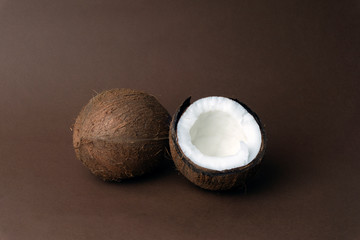 Coconuts on brown chocolate background