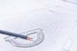© serkucher - Gray pencil with a protractor in the drawings