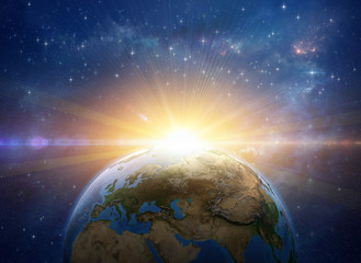 Wall Mural - sunrise, explosion, meteor impact on planet earth from space