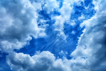 Wall Mural - white clouds with blue sky background.