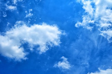 Wall Mural - white clouds with blue sky background.