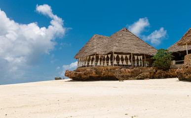 Wall Mural - Relaxing outdoor restaurant at the remote paradise beach