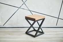Two Stylish Chairs Made Of Wood And Metal