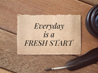 Wall Mural - Motivational and inspirational quote - Everyday Is A Fresh Start written on a paper.