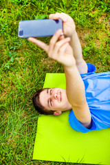 Canvas Print - Young Man take a Selfie