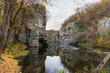 © An-T - Overhanging rocks over calm river in canyon at late autumn