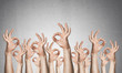 © adam121 - Row of man hands showing okay gesture