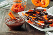 © lithiumphoto - Homemade candied pumpkin slices covered with melted chocolate