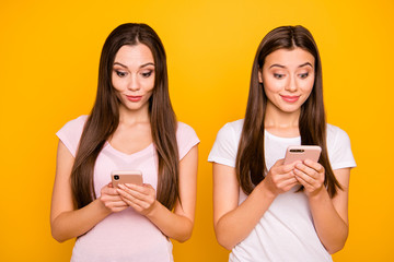 Canvas Print - Portrait of nice-looking cute charming lovely sweet winsome attractive amazed cheerful cheery straight-haired girls using 5g app isolated over bright vivid shine background