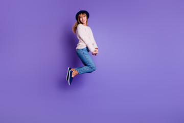 Wall Mural - Full length body size view photo charming pretty attractive teen teenager have holidays  rejoice candid content isolated sweater modern denim blue sneakers colorful background