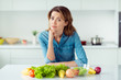 © deagreez - Portrait of her she nice lovely charming cute attractive sad bored brown-haired lady amateur culinary specialist learning hot to cook in light white interior style kitchen