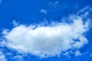 Wall Mural - white clouds with blue sky background.