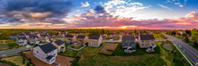Aerial View Of New Construction Street With Luxury Houses In A Maryland Upper Middle Class Neighborhood American Real Estate Development In The USA With Stunning Sunset Color Sky
