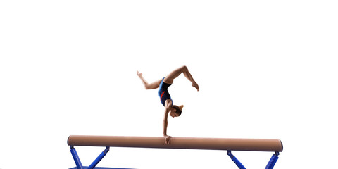 Wall Mural - Female athlete doing a complicated exciting trick on gymnastics balance beam on white background. Isolated Girl perform stunt in bright sports clothes