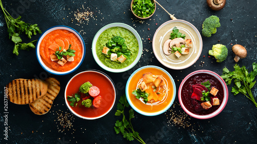 Fotografía Assortment of colored vegetable cream soups