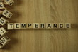 Temperance word from wooden blocks on desk