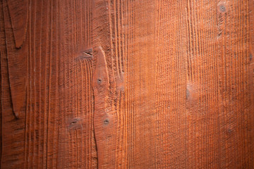 Background of aged wood red-orange color