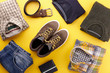 © kobeza - Mens casual clothing outfits and accessories flat lay on yellow background, top view