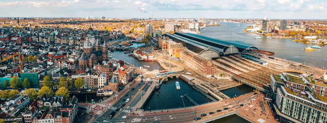 Wall Mural - beautiful aerial amsterdam view from above with many narrow canals, streets and architectures.