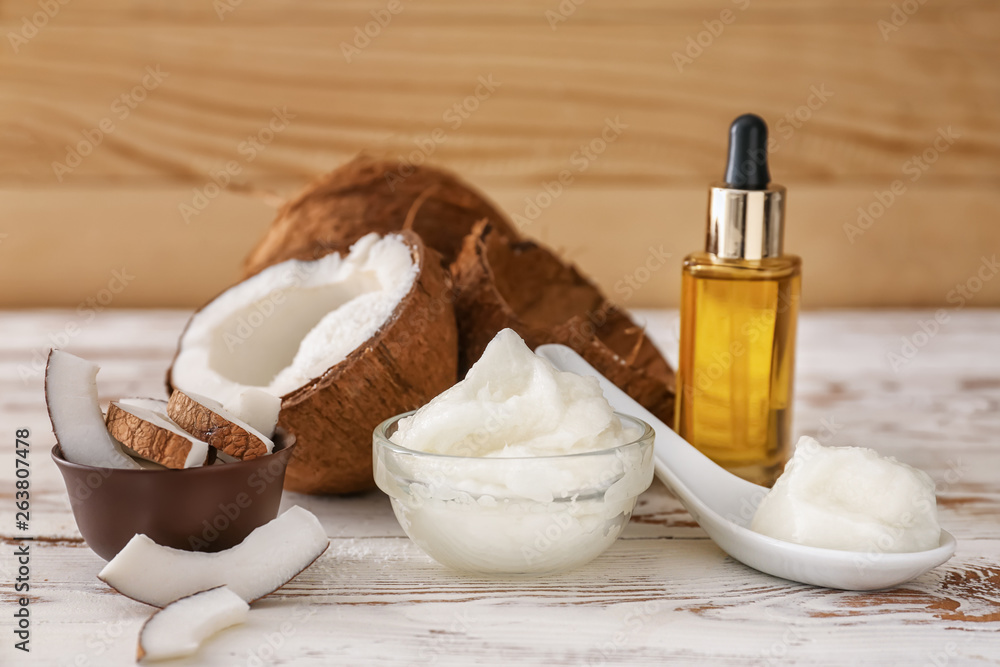 Composition with coconut oil on table