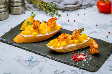 Wall Mural - Bruschetta with prawns and mango