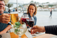 Tourists Having Drinks In Porto