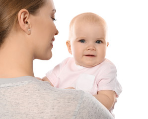 Wall Mural - Young mother with her baby isolated on white