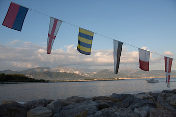 Wall Mural - Italian Naval Flags with view of bocca di magra and Carrara