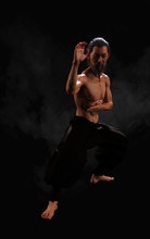 3d Illustration Human Martial Arts Sports Training With Clipping Path, Kung Fu Master, Muscle Man In Dark Background. 