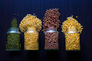 various grain with black wooden background