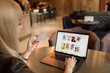 © VAKSMANV - Women hands using smartphone and laptop computer for online shopping. Payment Detail page display.