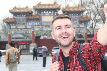 Wall Mural - Happy man vacationing in Asia 