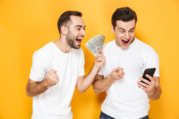 Poster - Two cheerful excited men friends wearing blank t-shirts