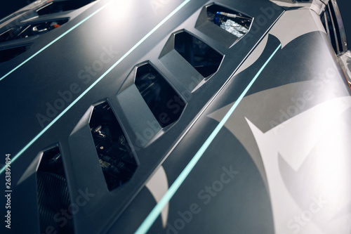 Fotografía Supercar engine hood with air intake and ventilation
