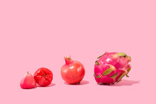 Exotic Tropical Fruits On Pink Background - Pomegranate, Pitaya, Dragonfruit, Jambu