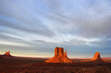 Fototapeta  - Clouds  at Sunrise in Monument Valley