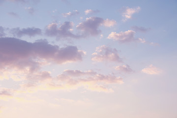 Wall Mural - Beautiful evening cloudy sky in pastel tones