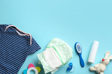 Wall Mural - flat lay composition with baby accessories and space for text on color background