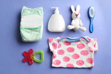 Wall Mural - flat lay composition with baby accessories on color background