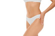 © Peakstock - Perfect slim toned female body, cropped women's slim smooth belly.
