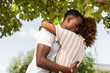 © Samuel B. - Outdoor protrait of black african american couple embracing each other