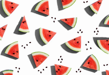 Wall Mural - Sliced watermelons arranged on a white background