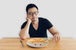 © Sevendeman - Sad and boring man is eating homemade breakfast set of omelet.