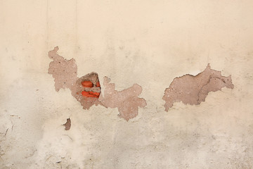 Wall Mural - Peeling paint on a cement wall surface