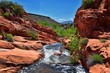 © Jeremy - Views of Waterfalls at Gunlock State Park Reservoir Falls, In Gunlock, Utah by St George. Spring run off over desert erosion sandstone. United States.
