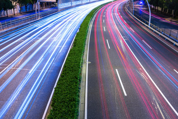 The cars on the highway light trails in Shanghai, China