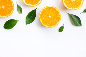 Top view of orange fruits and leaves isolated on white background.