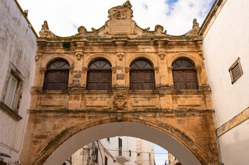 Italy, Ostuni, ancient passage between two houses